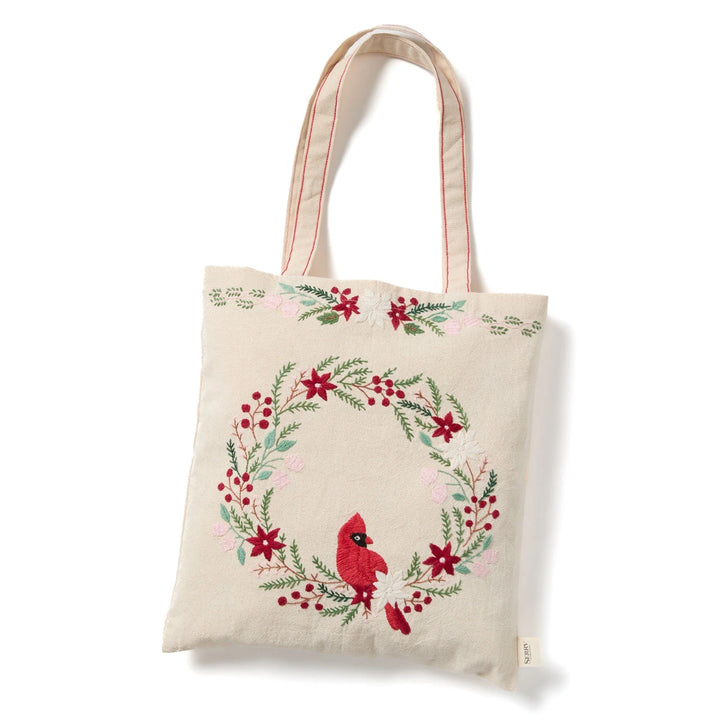 a cardinal embroidered canvas tote bag on a white background