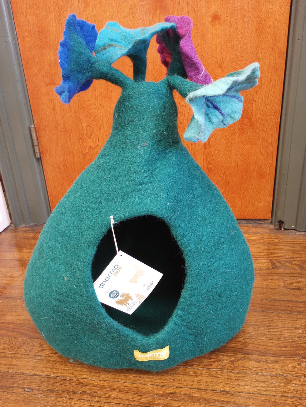 A blue cat cave with flowers by Karma Cat.