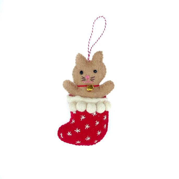a felted ornament of a cat in a Christmas stocking