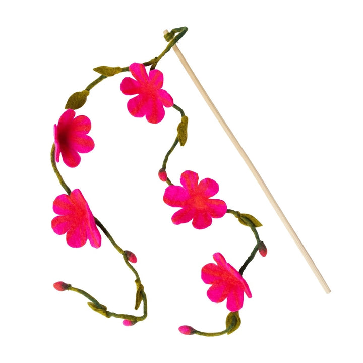 Floral cat teaser with pink flowers and a stick on a white background