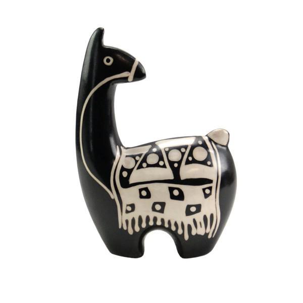 Black and white ceramic llama figurine on a white background