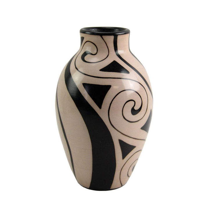 Ceramic vase with black spiral and geometric patterns on a beige background