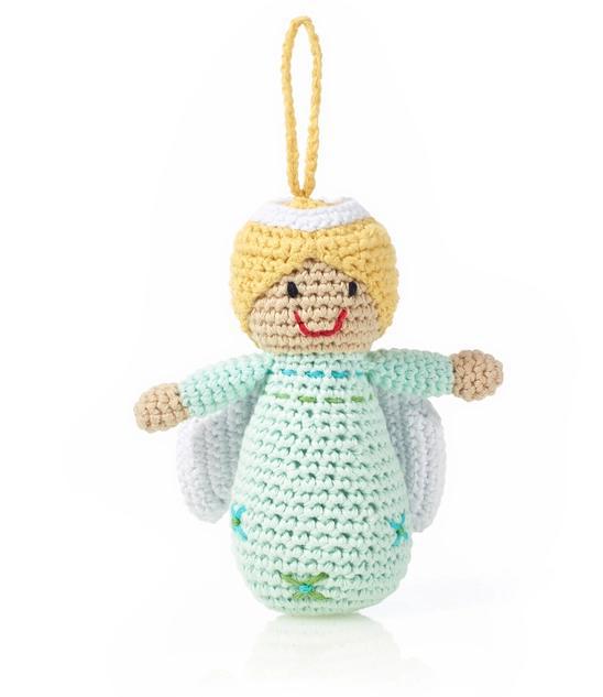 Crocheted angel toy with a white halo on a white background