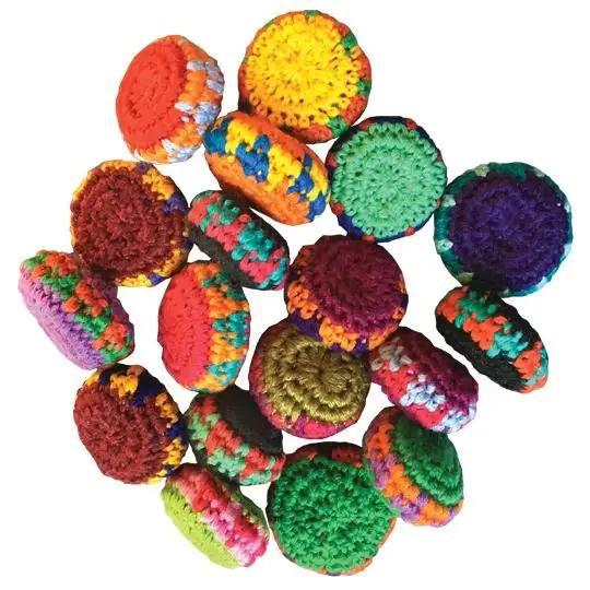 Colorful crocheted pucks on a white background