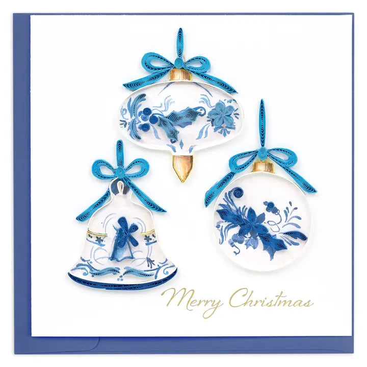 Decorative Christmas ornaments with blue and white designs on a card with 'Merry Christmas' text.