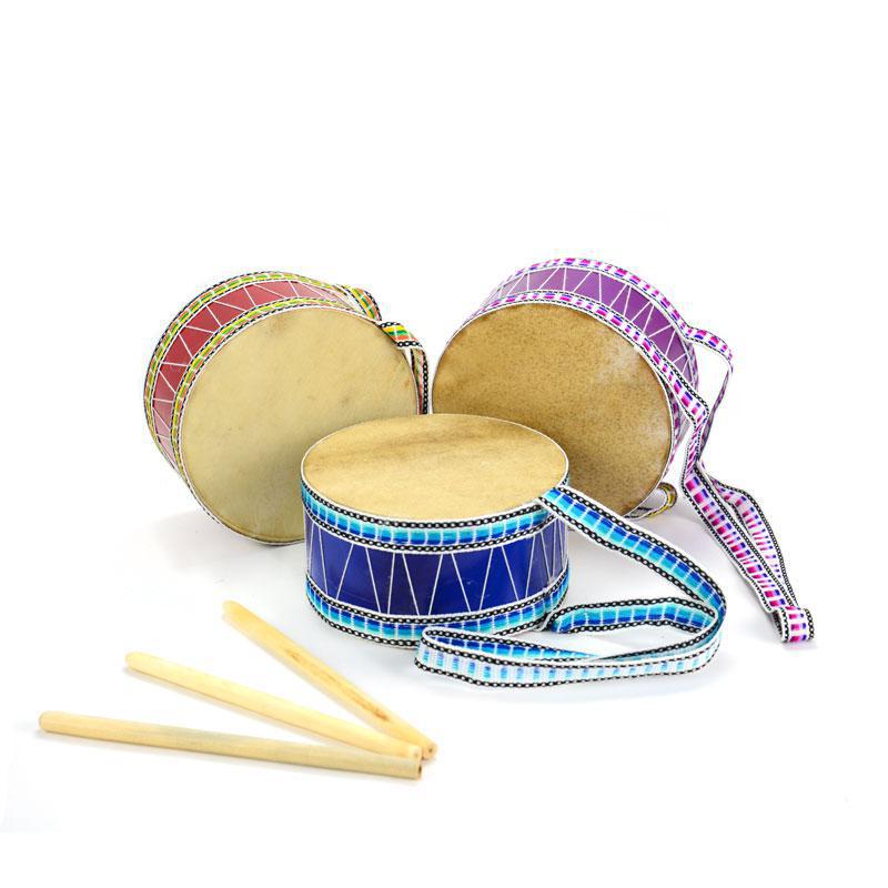 Set of colorful drums with drumsticks on a white background