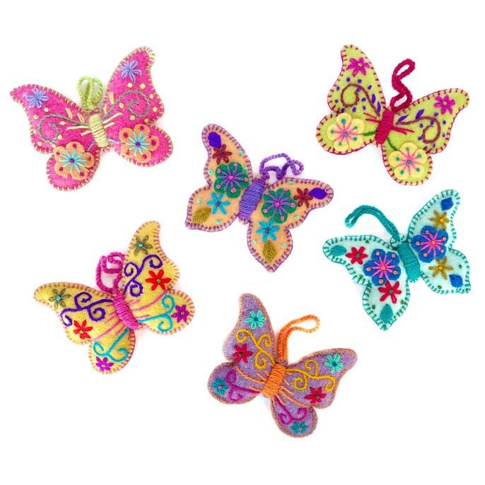 A collection of colorful handmade butterfly ornaments with embroidered details and felt embellishments.