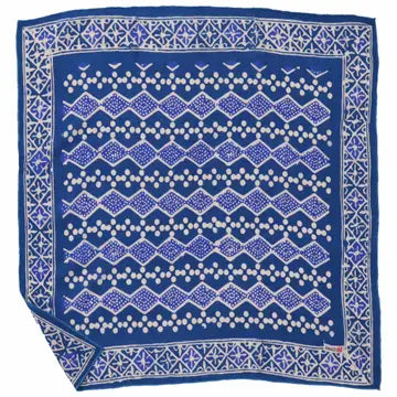 blue and white batik bandana on a white background