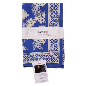 Blue and white patterned fabric with a visible brand label on a white background