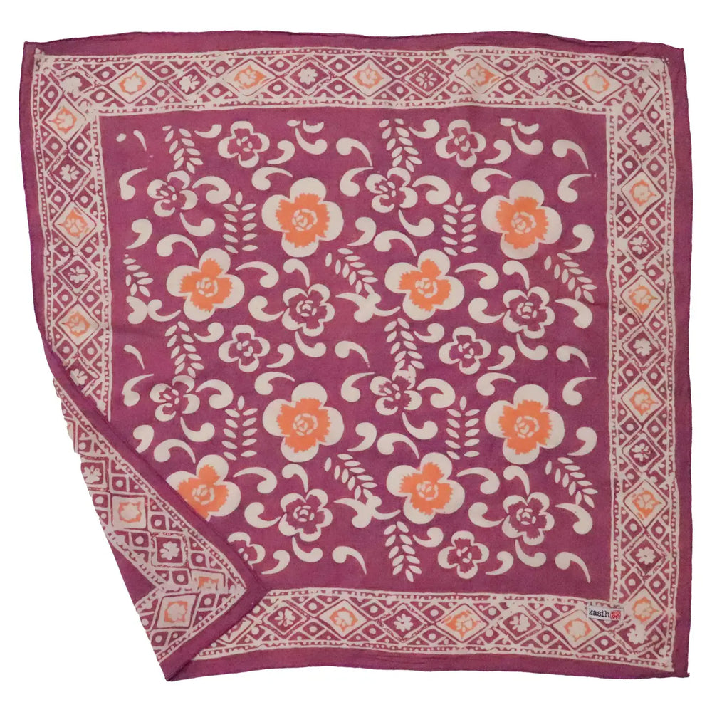 Floral patterned bandana with a purple border on a white background