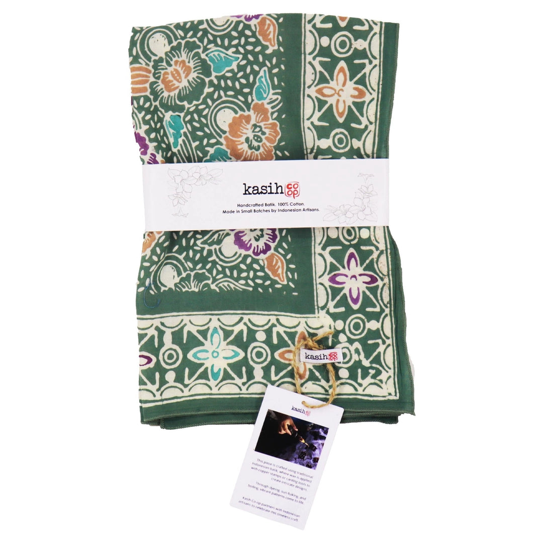 a green bandana with a kasih logo