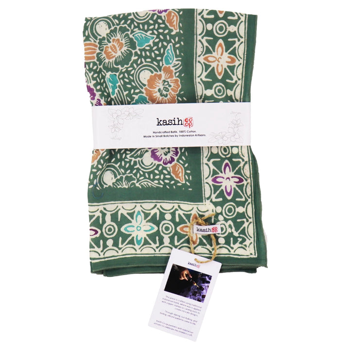 a green bandana with a kasih logo