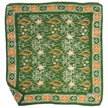 green with orange bandana on a white background