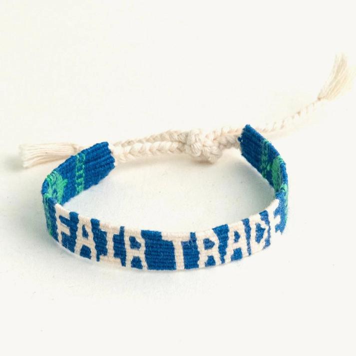 Woven bracelet with blue and white pattern on a white background