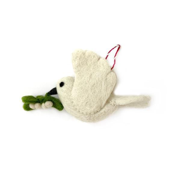 A handcrafted felt wool ornament in the shape of a white dove with an olive branch in its beak, with red and green details on the wings.