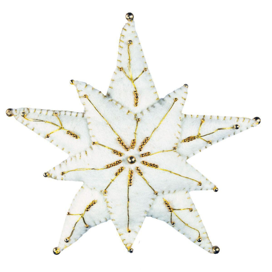 Decorative star ornament with gold accents on a white background