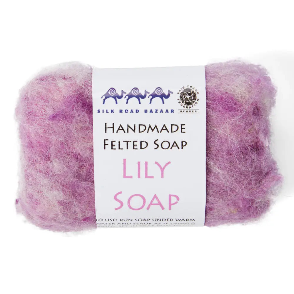 Handmade felted soap with a label on a white background