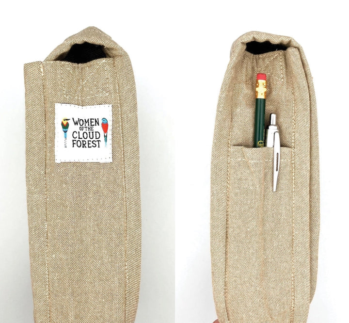 Two views of a beige woven fabric pen pouch on a white background. The left view shows the front with a white patch reading 'WOMEN IN CLOUD FOREST' with colorful pen illustrations.