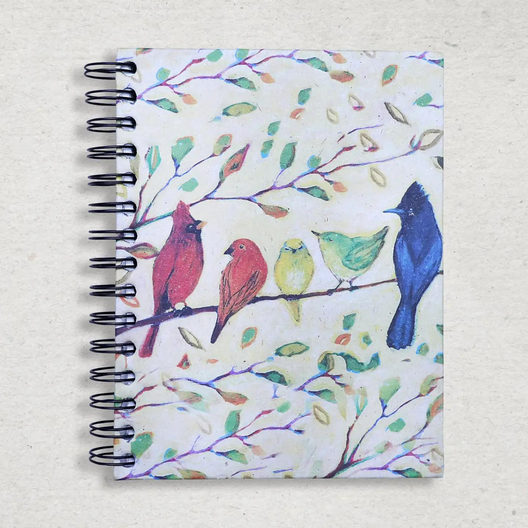 Mr. Ellie Pooh notebook with colorful bird design on a white background
