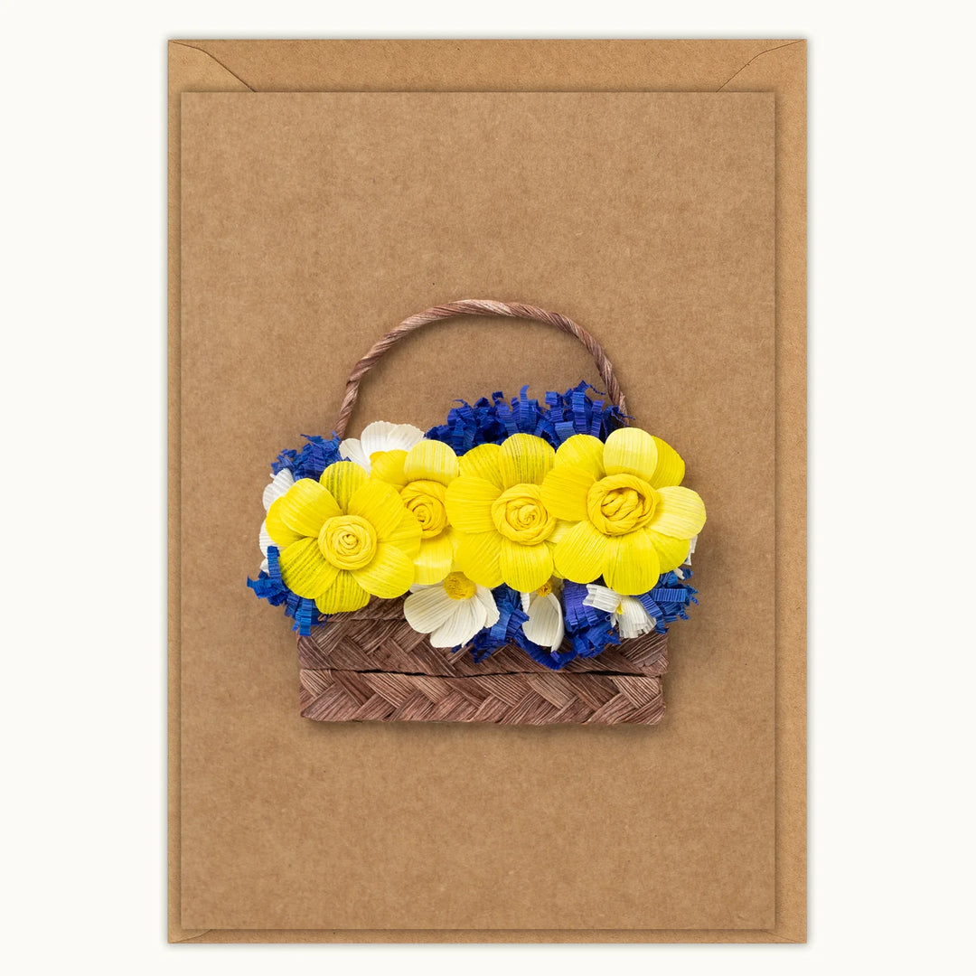 Floral basket decoration on a brown card