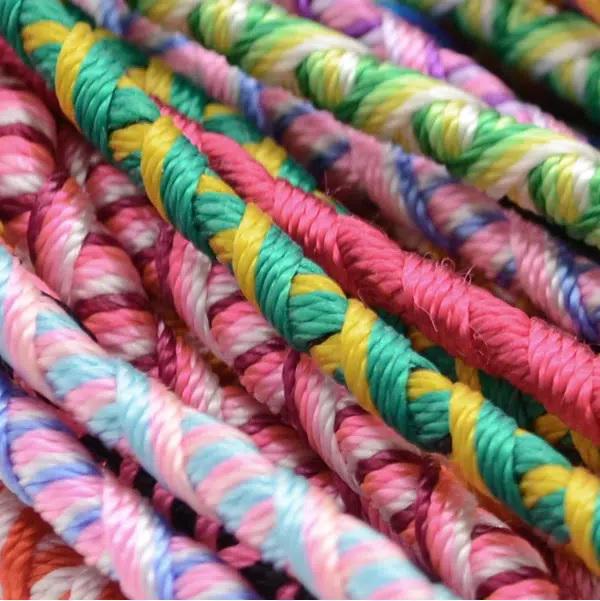 a close up of friendship bracelets