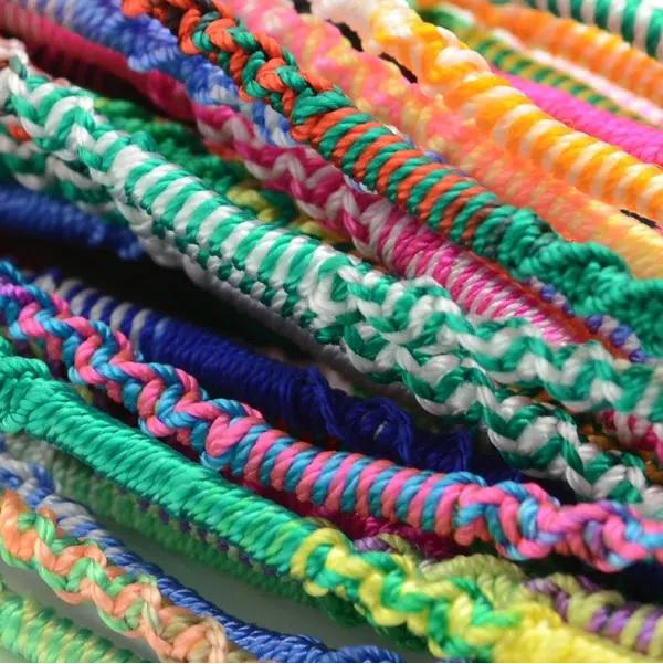 a close up of friendship bracelets