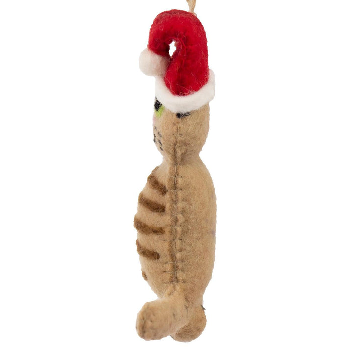 Plush toy tabby cat with a red and white Santa hat on a white background