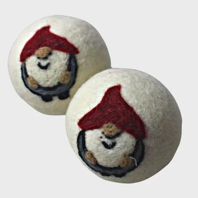 two gnome dryer balls on a white background