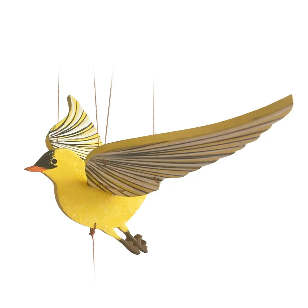 Yellow bird-shaped mobile with open wings on a white background