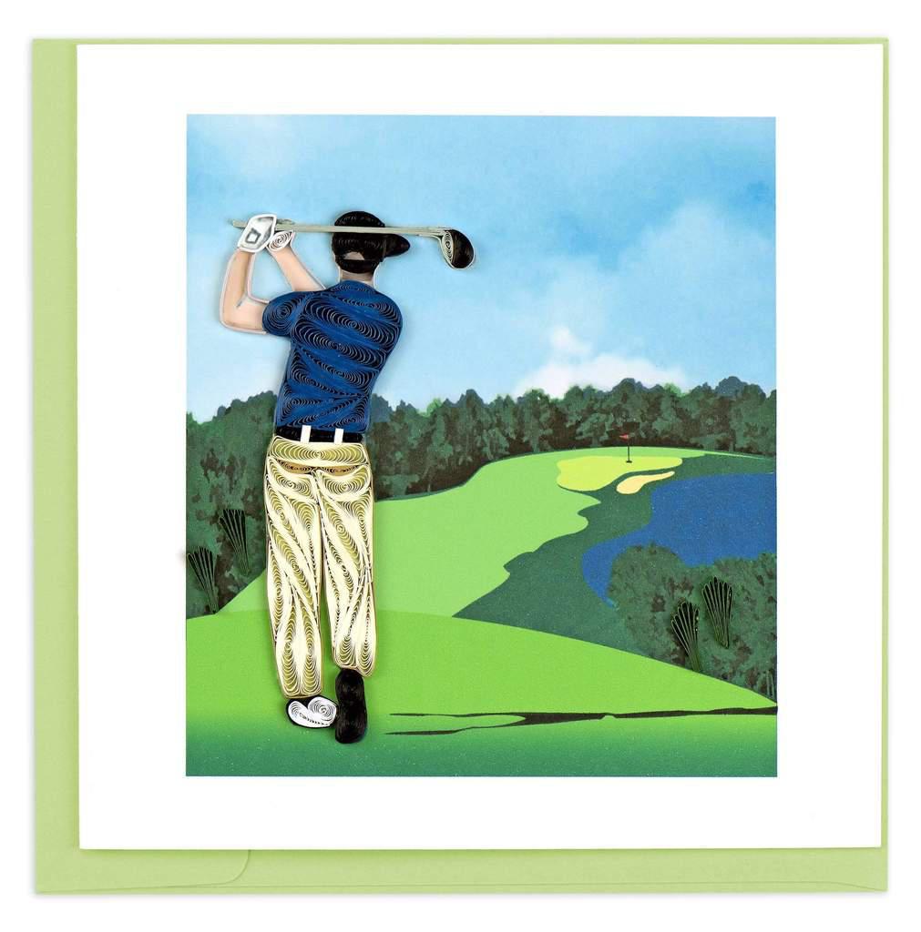 A handcrafted greeting card featuring a quilled design of a golfer with a golf club, set against a landscape background.