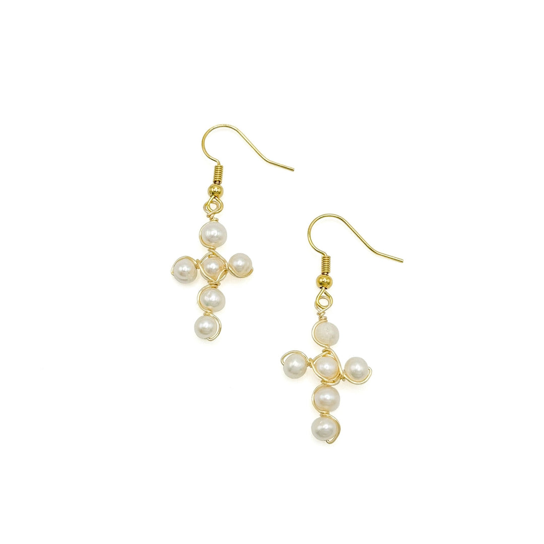 Pearl cross-shaped earing with gold metal