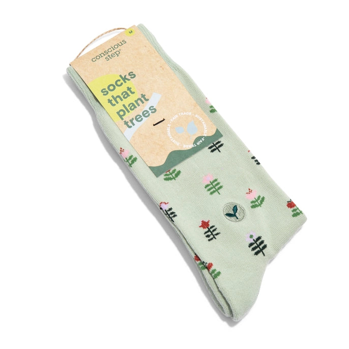 Conscious Step green crew socks with tulips on a white background