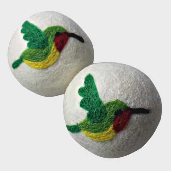 hummingbird dryer balls on a white background