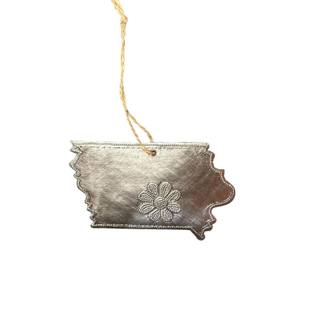 Decorative ornament shaped like a state of Iowa with a floral design on a white background