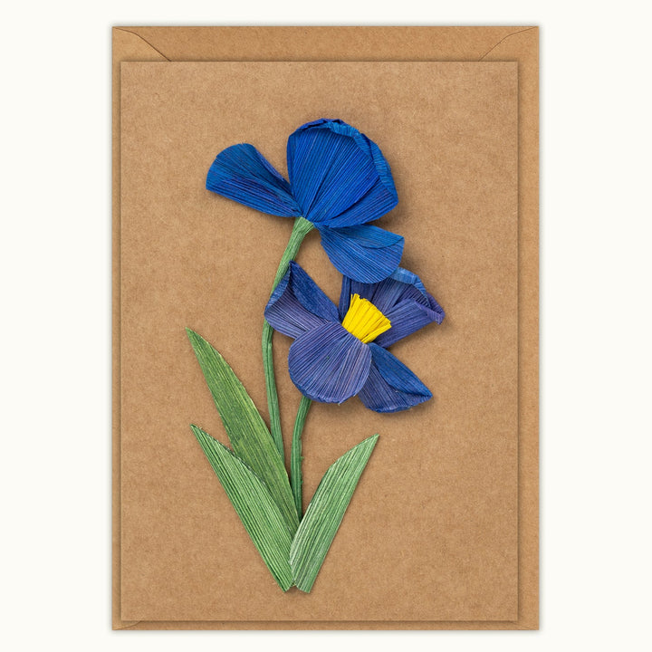 Card with blue flower design on a brown background