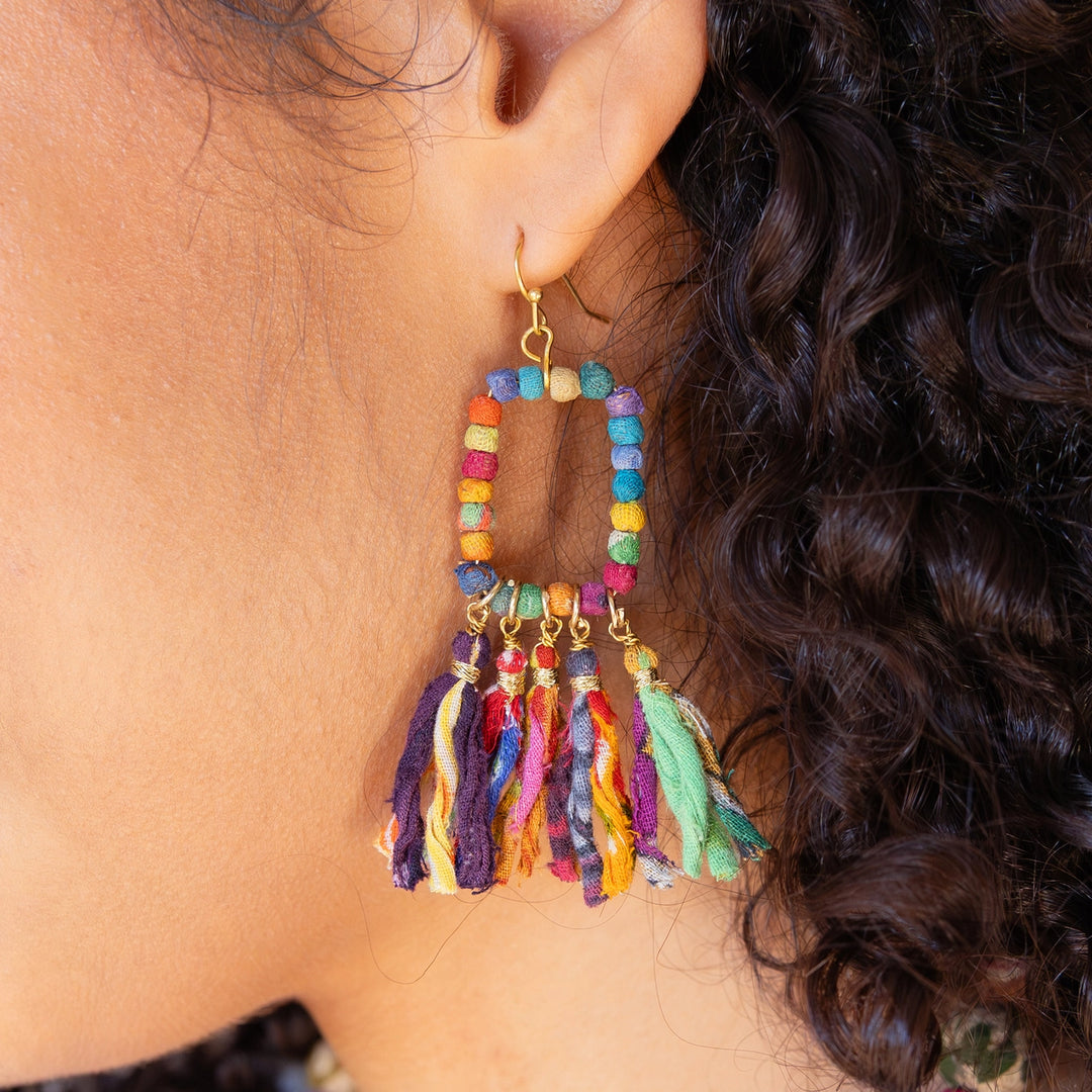 Close-up of Sari Kantha colorful gold-plated fringed rectangle earrings 