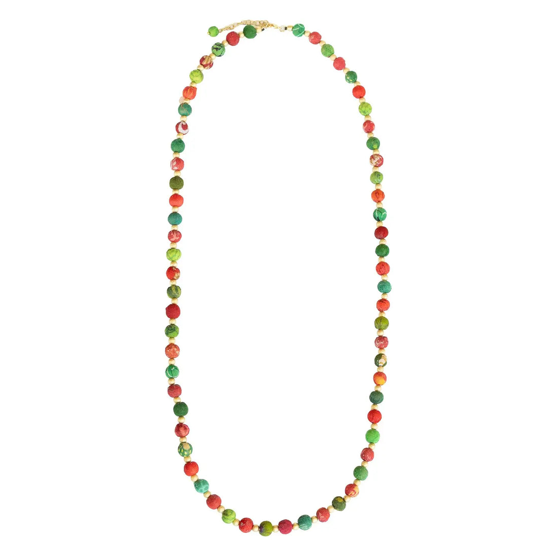 A beaded necklace made of small round beads in red and green, with a gold clasp, shown on a plain white background.