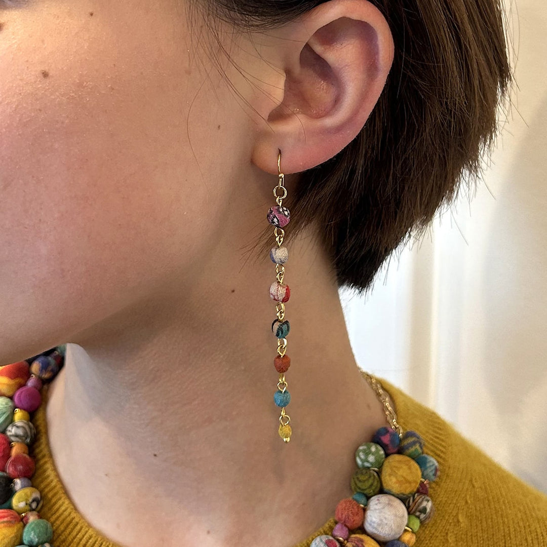 Close-up of Sari Kantha Linear multicolor gold-plated dangle earrings