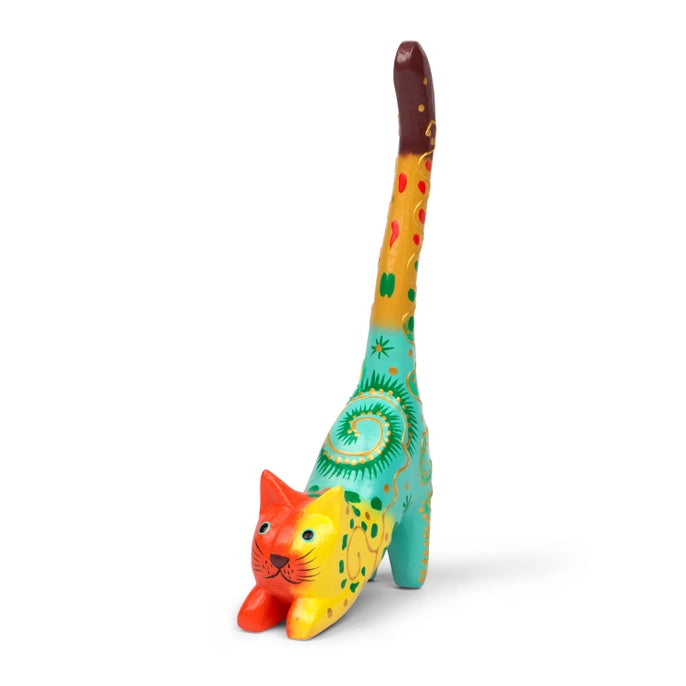 Colorful cat-shaped ring holder on a white background