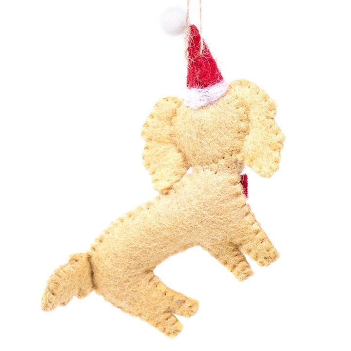 Felt labradoodle ornament with a Santa hat on a white background