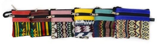 Set of colorful patterned pouches with zippers on a white background