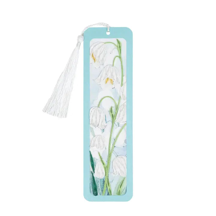 Bookmark with floral design and tassel on a white background