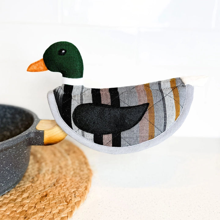Fabric duck-shaped pot holder with a checkered pattern on a white background