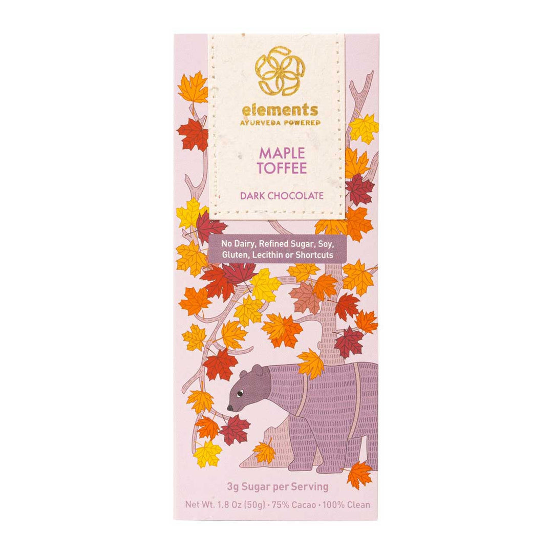 A Maple Toffee chocolate bar packaging with autumn leaves and a bear illustration on a white background