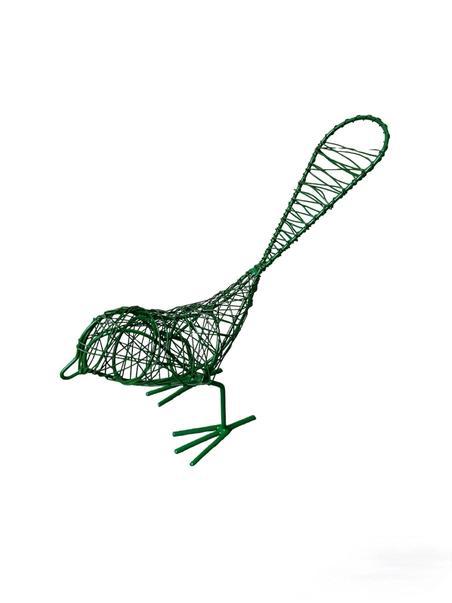 Green hand made metal wire bird on a white background.