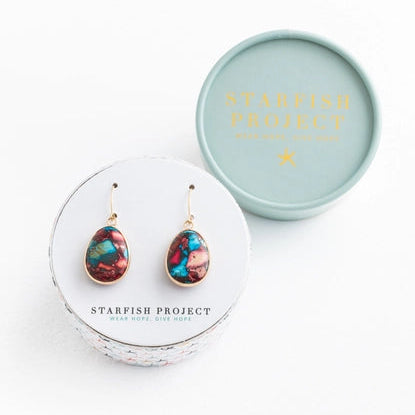 Teardrop earrings with colorful stones in a 'Starfish Project' box on a white background