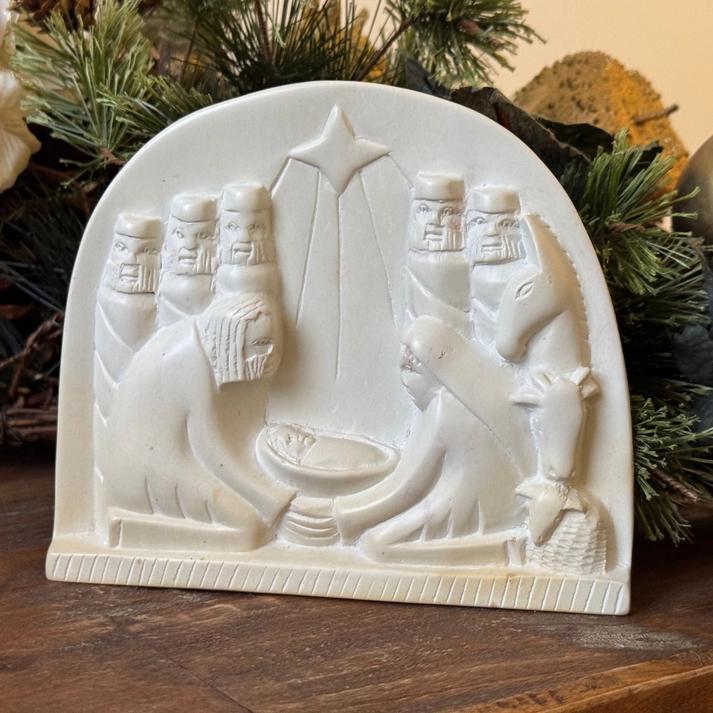 Nativity stone plaque scene displayed 