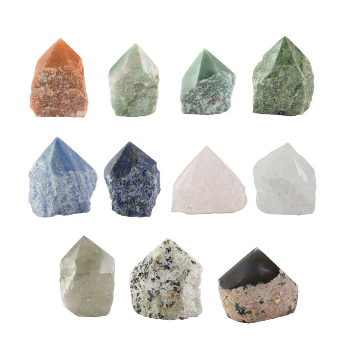 Collection of various crystal stones on a white background