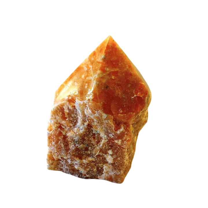 orchid calcite stone point on a white background