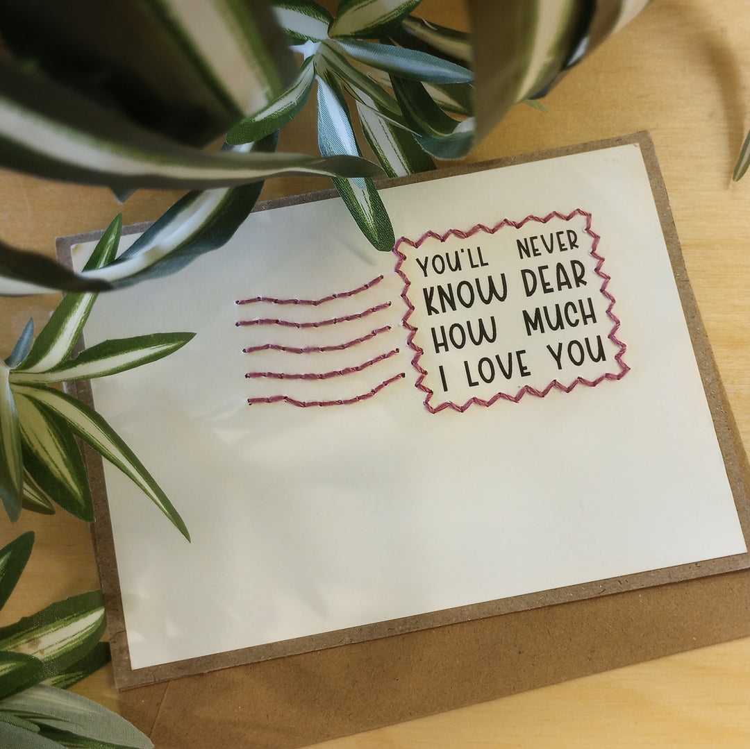A card that says You"ll never know dear how much I love you"